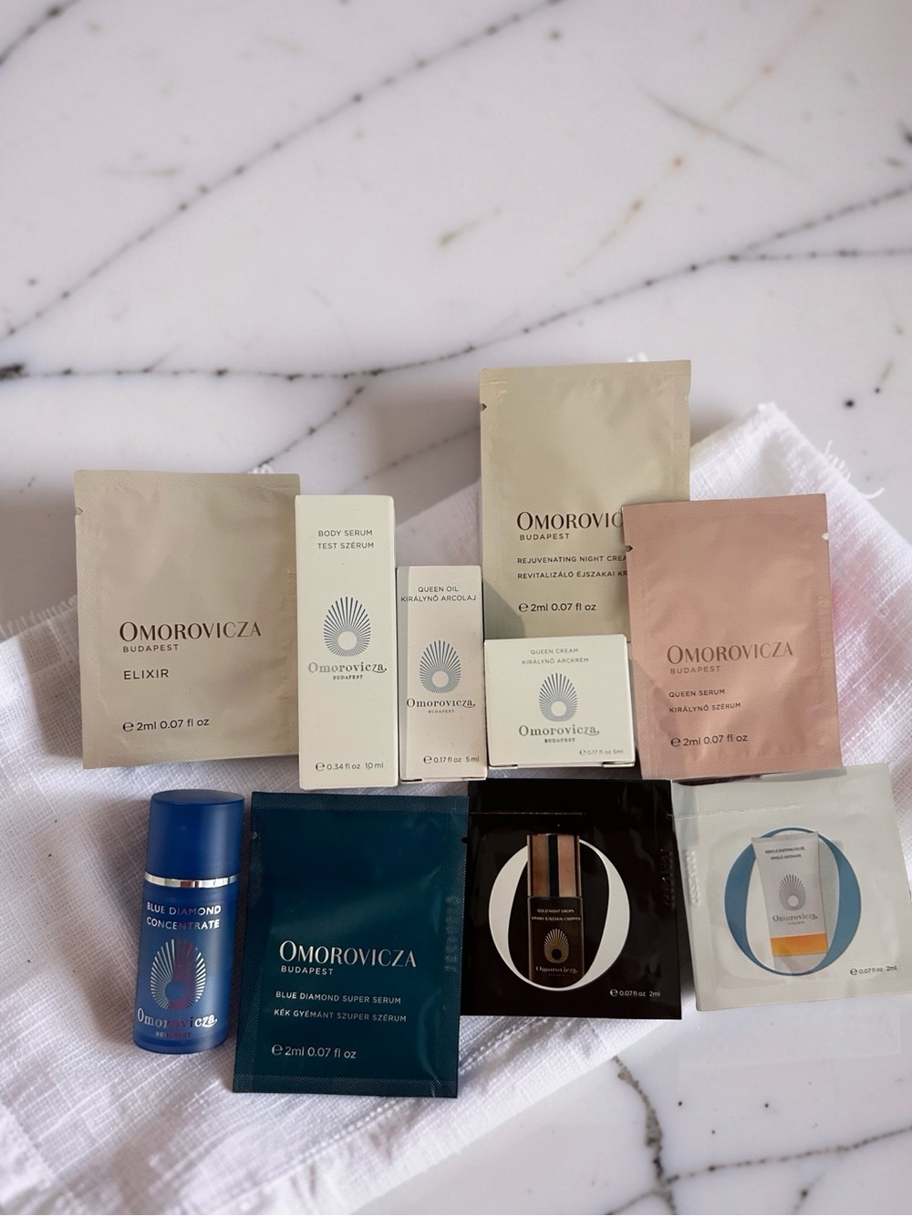 Omorovicza Skincare Sample Set — Mixed Beige, Pink & Blue Sachets